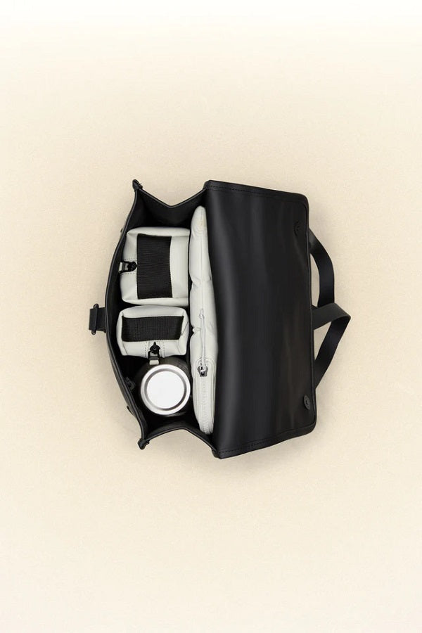 backpack rains mini making it ideal for daily commutes or travel Rains Sibu Rolltop Rucksack Mini